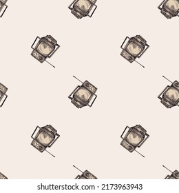 Retro TV engraved seamless pattern. Vintage television with antenna in hand drawn style. Sketch old device. Texture for fabric, wallpaper, textile, print, title, wrapping paper. Vector illustration.