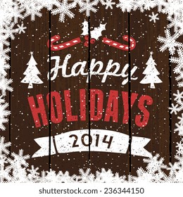 Retro typographic design greeting card for Christmas on wood background.