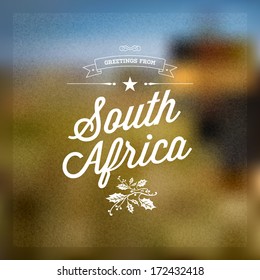 Retro Typographical, Vintage Touristic Greeting label on blurry background "Greetings from South Africa", Vector design.