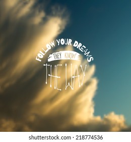 Retro typography with inspirational quote "Follow your dreams, they know the way". Vector blurred sky background. 