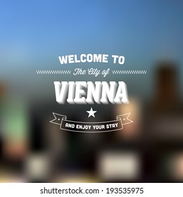 Retro Typography. Travel label on blurry background - "Welcome to the city of Vienna, and enjoy your stay". Vector design. 