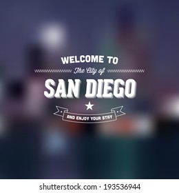 Retro Typography. Travel label on blurry background - "Welcome to the city of San Diego, and enjoy your stay". Vector design. 