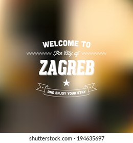 Retro Typography. Travel label on blurry background - "Welcome to the city of Zagreb, and enjoy your stay". Vector design. 