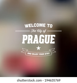 Retro Typography. Travel label on blurry background - "Welcome to the city of Prague, and enjoy your stay". Vector design. 