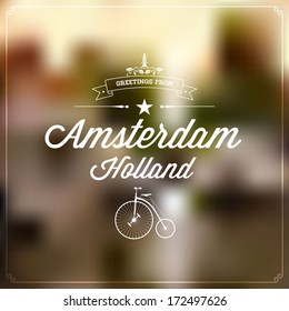 Retro Typography, vintage Touristic Greeting label on blurry background "Greetings from Amsterdam, Holland", Vector design.