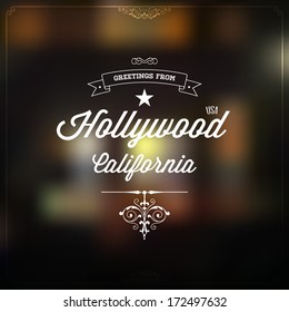 Retro Typography, Vintage Touristic Greeting label on blurry background "Greetings from Hollywood, California, USA", Vector design.