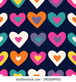 Retro Valentine's Day Holiday Hand-Drawn Doodle Colorful Hearts on Dark Background Vector Seamless Pattern. Retro Seventies Bright Whimsical Feminine Print for Fashion, Packaging, Wrapping