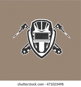 Retro vintage design logo with masks of the welder vector illustration