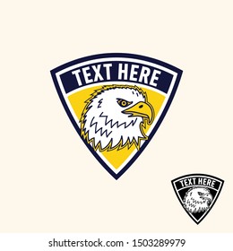 Retro vintage eagle falcon hawk emblem or patch for sport team or apparel