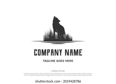 Retro Vintage Howling Wolf with Grass Savanna Logo Design Vector