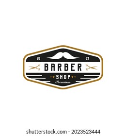 Retro Vintage Style for Barber Shop Logo Design. With moustache, and scissors icons in gold, black and white colors. Premium and Luxury Logo Template