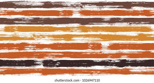 Retro watercolor brush stripes seamless pattern. Orange, yellow and brown paintbrush lines horizontal seamless texture for background. Hand drawn paint strokes graphic artwork. For garment.