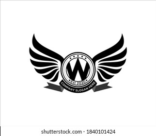 Retro wings badge with letter W . vintage logo vector design element