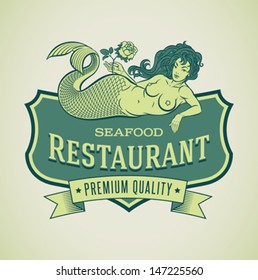 Retro-styled seafood restautant label including an image of mermaid. Editable vector.