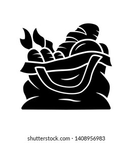 Reusable produce bag glyph icon. Zero waste recyclable textile bag for grocery products. Organic market tote. Silhouette symbol. Negative space. Vector isolated illustration