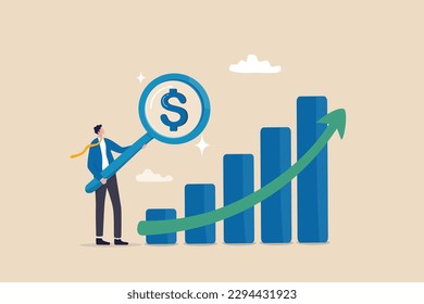 Revenue or salary increase, growth investment profit or earning from stock market, money or wages growing concept, businessman with magnifying glass on dollar money sign with growth graph and chart.