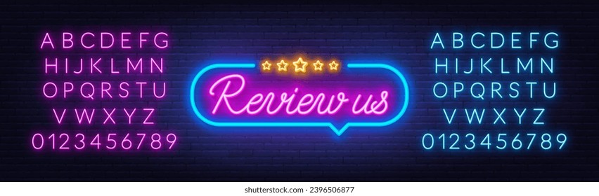 Review Us neon sign in the speech bubble on brick wall background.