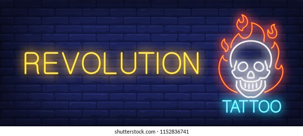Revolution neon text with smiling skull on fire. Tattoo salon or studio concept. Advertisement design. Night bright neon sign, colorful billboard, light banner. Vector illustration in neon style.