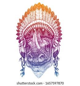 Rhino. Animal. Vector portrait in traditional indian headdress with feathers. Tribal style illustration for little children clothes. Image for kids tee fashion, posters.