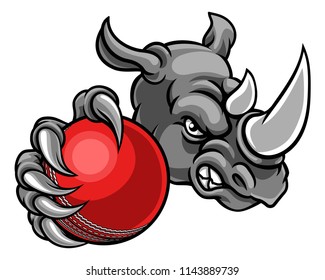 A rhino cricket animal sports mascot holding a ball
