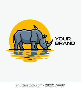 Rhino drinking at sunset with bird mascot design.