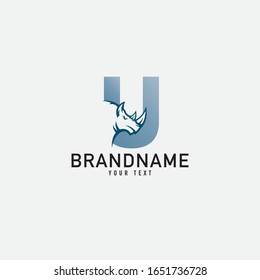 Rhino silhouette inside the letter U