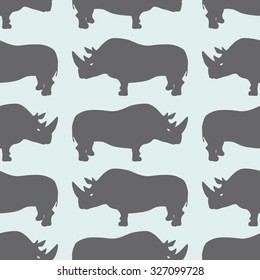Rhino silhouettes. Rhino Seamless Pattern. Vector Background.