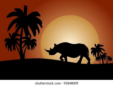 Rhino at sunset in the savannah