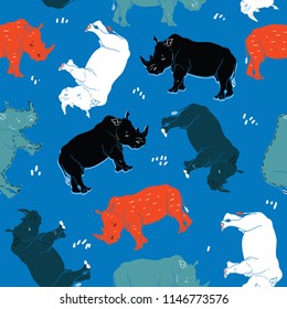 Rhino vector seamless pattern isolated on blue background. African motive for fabric, textile, wallpaper. Black, blue, white, red, green rhinoceros