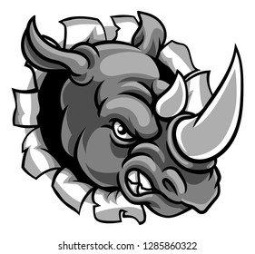 A rhinoceros or rhino angry mean animal sports mascot cartoon head breaking through the background
