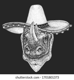 Rhinoceros, rhino portrait. Sombrero is traditional mexican hat. Mexico. Head of wild animal.