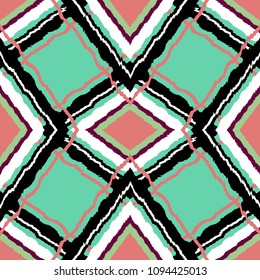 Rhombic seamless pattern on a green background . Ethnic abstract textures. Suitable for fabrics, clothing, Wallpaper, paper, tableware, decorating any surfaces.