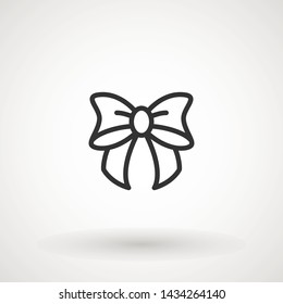 Ribbon Bow Vector Icon. Black gift bow silhouette. Template design for surprise, celebration event, presents, birthday, Christmas.