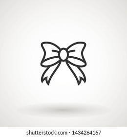 Ribbon Bow Vector Icon. Black gift bow silhouette. Template design for surprise, celebration event, presents, birthday, Christmas.