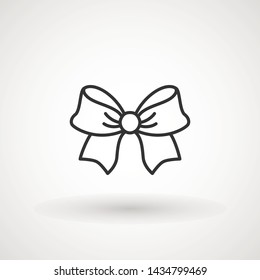 Ribbon Bow Vector Icon. Black gift bow silhouette. Template design for surprise, celebration event, presents, birthday, Christmas.