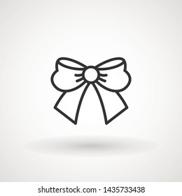 Ribbon Bow Vector Icon. Black gift bow silhouette. Template design for surprise, celebration event, presents, birthday, Christmas.