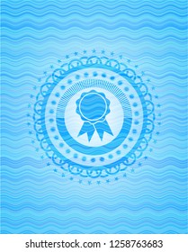 ribbon icon inside light blue water style emblem.