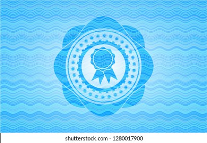 ribbon icon inside light blue water wave badge.