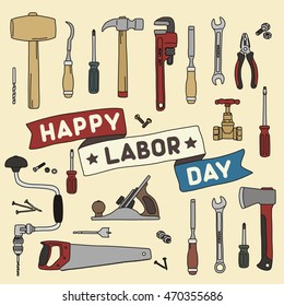 Ribbon with inscription "happy labor day" on background of hand tools.