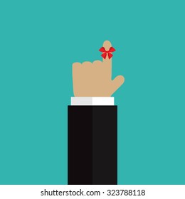 The ribbon on the finger reminder on turquoise  background