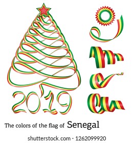 Ribbon in the shape of a Christmas tree with the colors of the flag of Senegal