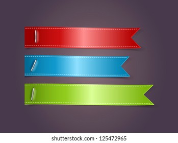 Ribbon tags attached with staples