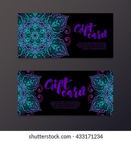 Rich gift certificates in the Indian style. Bohemian Cards with mandalas. Black and gold. Unique cards for printing supplies