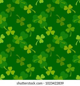Rich green clover leaves vector seamless pattern. Nature spring background. Irish traditional St. Patrick's day design element.