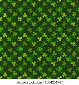 Rich green clover leaves vector seamless pattern. Nature spring background. Irish traditional St. Patrick's day design element.