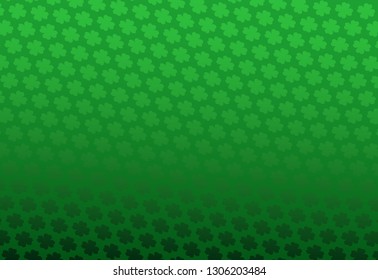 Rich green Saint Patrick's Day background with four-leaf clover shamrock leaves pattern. Irish celtic festival celebration greeting card design horizontal backdrop.