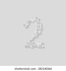 Richly decorated digit two on gray background