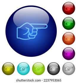 Iconos de contorno de la mano derecha apuntando sobre botones de vidrio redondo en varios colores. Estructura de capas arreglada