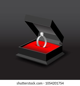 ring box with white gold or silver ring 