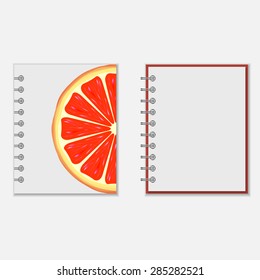 Ring-bound notebook cover design with bright grapefruit on white. Isolated on white